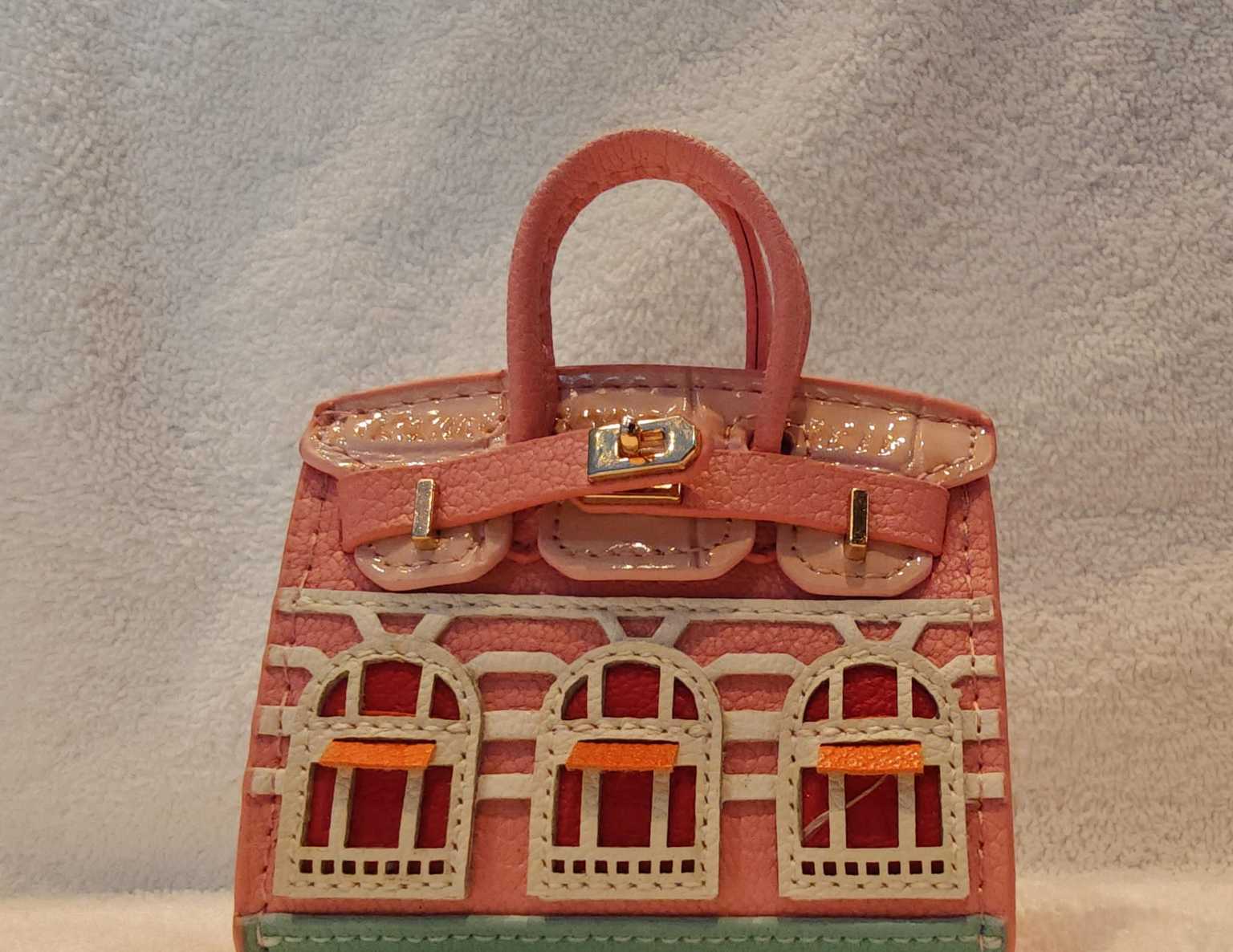 Caryina peach facade mini bag front hero view